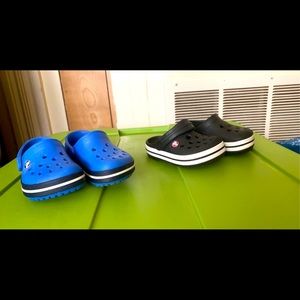 Two Pair Of Crocs